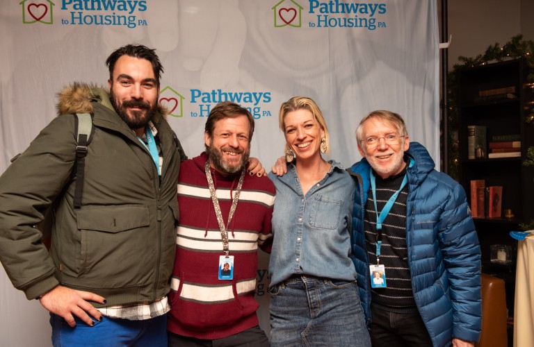 group of staff smiling together